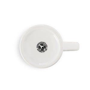 bottom of white diner mug with logo